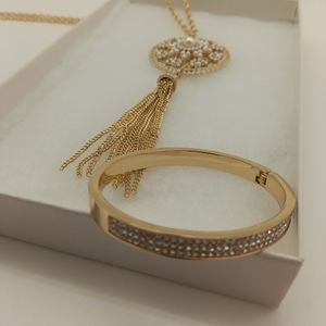 Golden Long Chain Tassel Necklace w/ Clasp Bracelet & faux crystals.